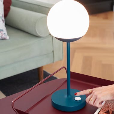 Hand switching on indoor lamp
