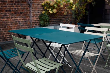 Folding metal square tables and chairs