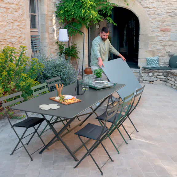 Showing the folding of outdoor large tables from the Fermob collections