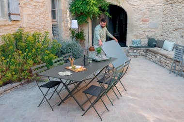 Showing the folding of outdoor large tables from the Fermob collections