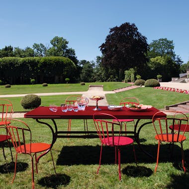 French large outdoor table in a chateau garden