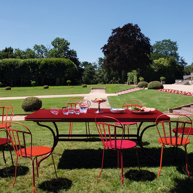 French large outdoor table in a chateau garden