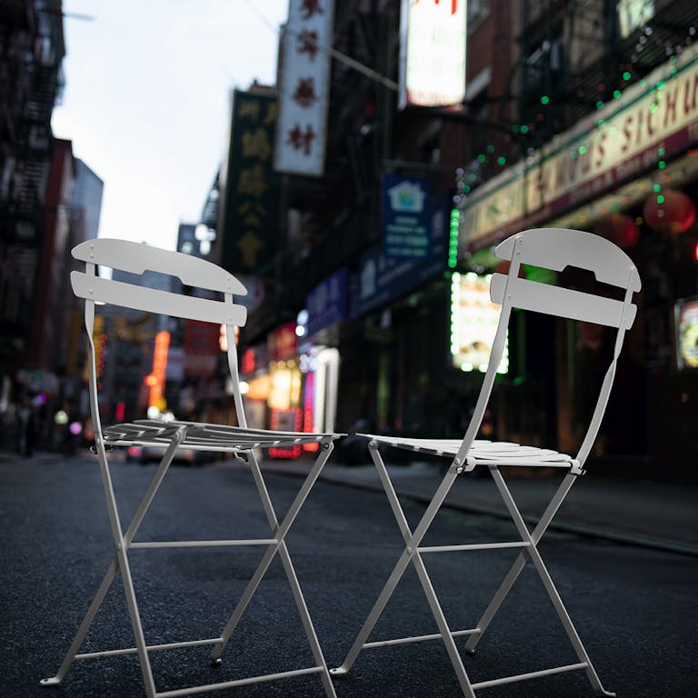 La Mome folding outdoor chairs on the streets of New York