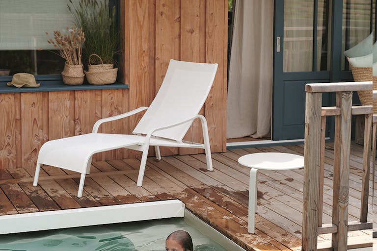 Fermob Alize Low Armchair by swimming pool