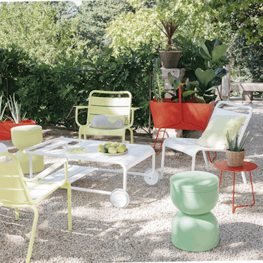 Luxembourg lounge armchairs in pebble courtyard