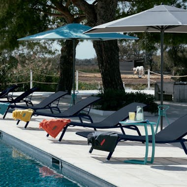 Alize sun loungers by hotel pool
