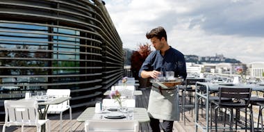 Fermob outdoor furniture at rooftop restaurant in France