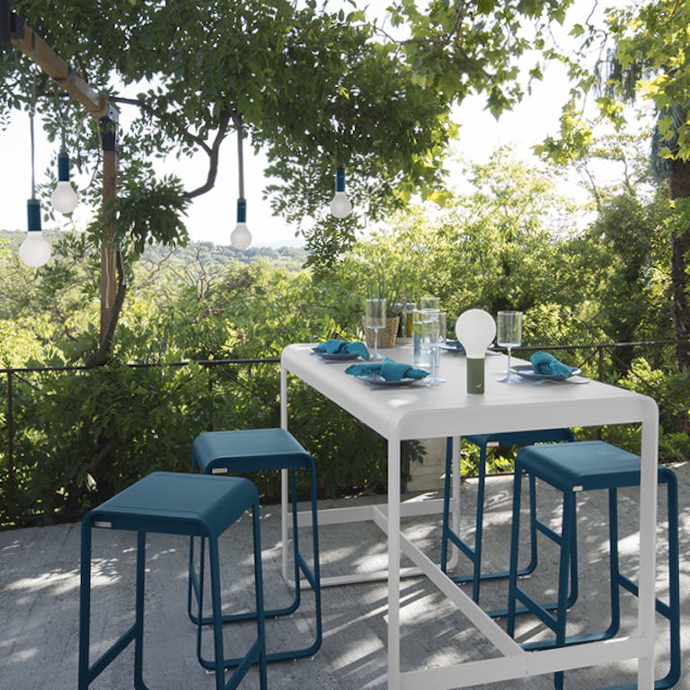 Fermob Belleive high bar table and stools on balcony