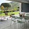 Fermob Luxembourg dining and lounge setting on contemporary deck