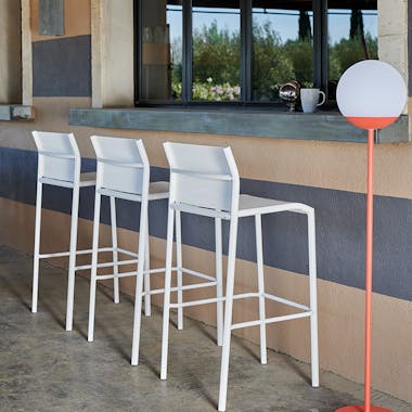 Cadiz high bar stool at outdoor bar