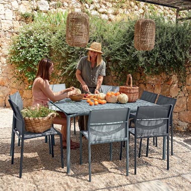 Fermob Calvi square outdoor table and Cadiz chairs in courtyard