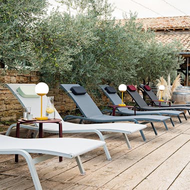 Fermob Alize sunloungers in a row