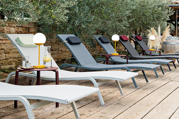 Fermob Alize sunloungers in a row