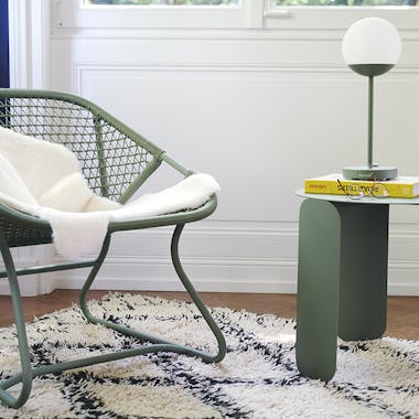 Fermob Sixties armchair with Bebop table and Mooon table lamp