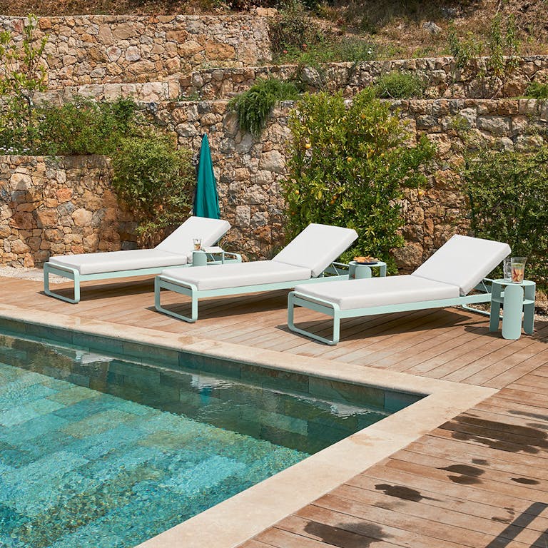 Fermob Bellevie sunlounger by pool