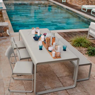 Fermob Bellevie table with internal storage by pool