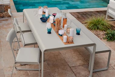 Fermob Bellevie table with internal storage by pool