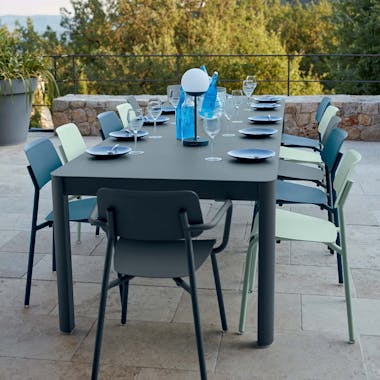 Fermob Ribambelle XL outdoor extending table with Studie outdoor chairs and armchairs