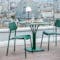 Fermob Studie chair and Luxembourg pedestal table on roof terrace