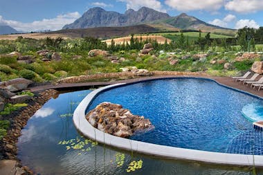 Babylonstoren pool with mountains in the background