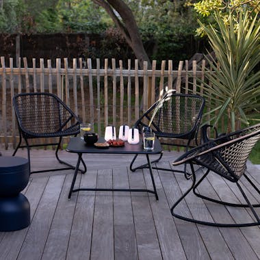 Fermob Sixties outdoor lounge setting with outdoor lamps