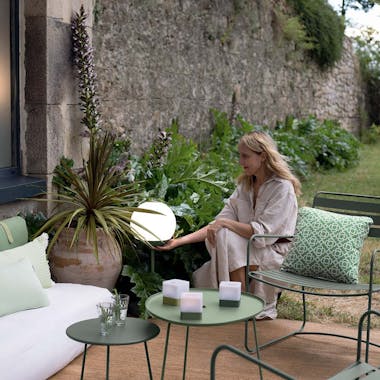 Fermob Surprising Low Armchair, Cocotte tables and Mooon! lamp in garden