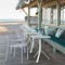 Fermob Cadiz armchairs with Rest'o table at beachfront restaurant