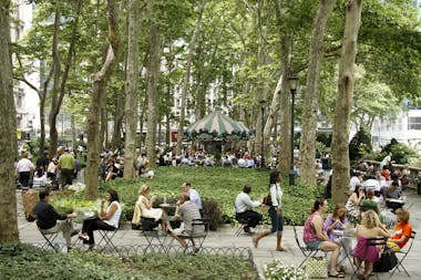 People sitting at Bistro settings in Bryant Park
