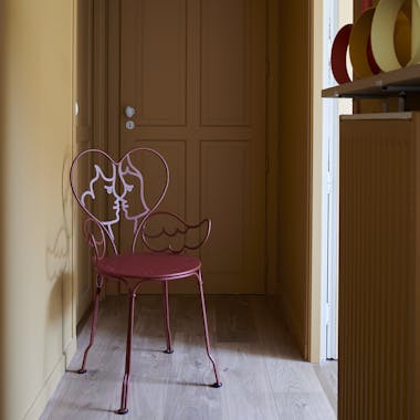 Fermob Ange chair sits in narrow hallway