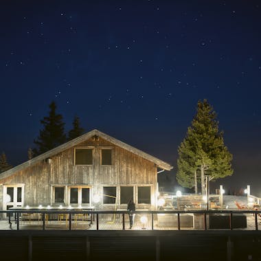 Fermob outdoor lamps on deck at ski chalet