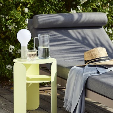 Fermob Bebop side table with Fermob Bellevie sunlounge